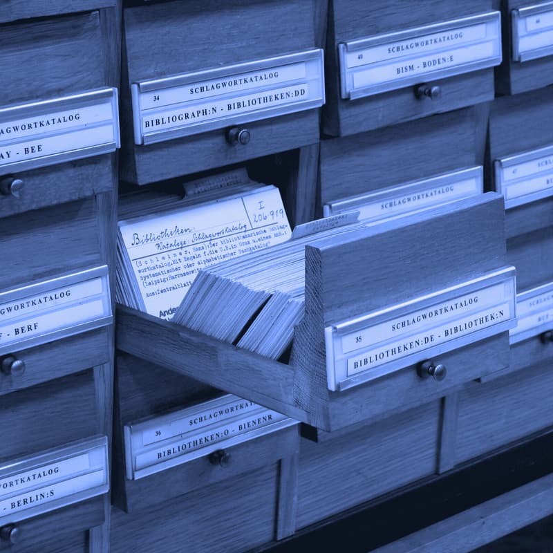 Card catalog drawers with handwritten index cards